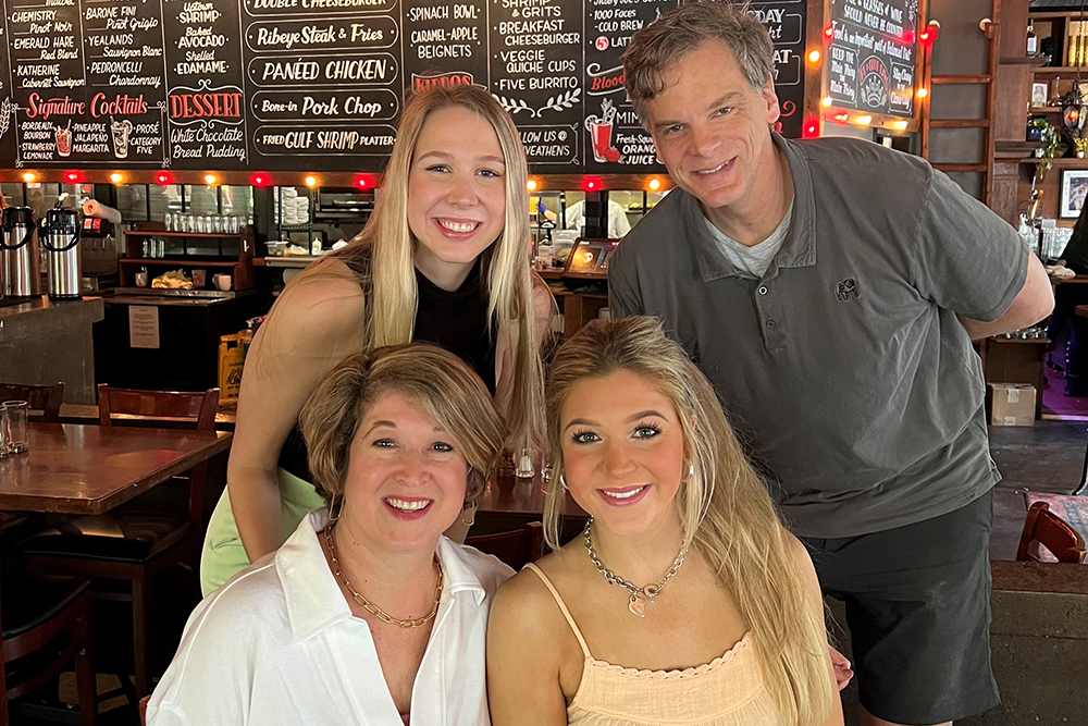 Frank and Megan Henning with their daughters 