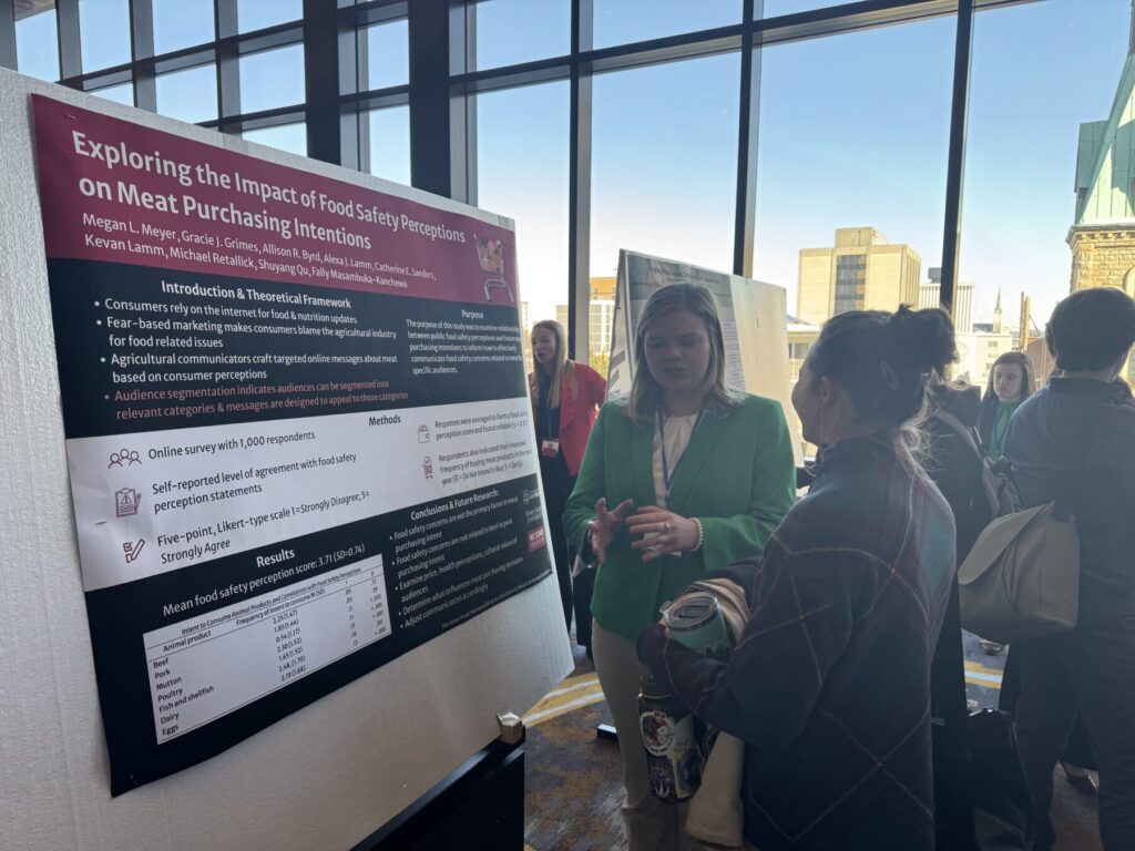 Megan presenting her poster
