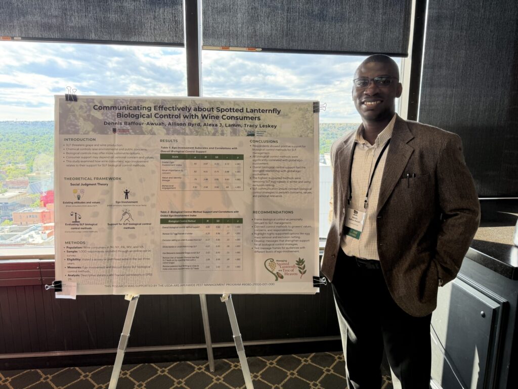 Baffour presenting poster at ACE