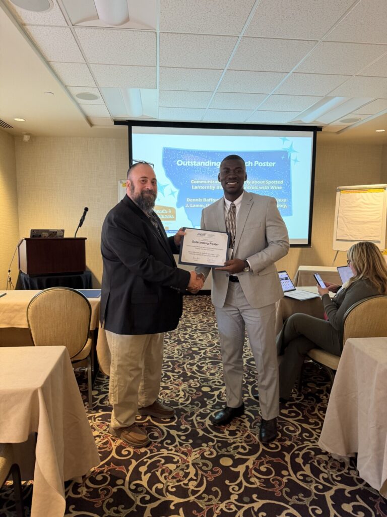 Baffour receiving award