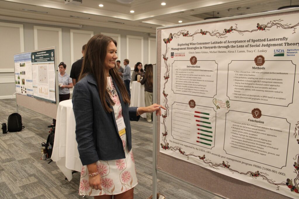 Gracie Grimes, presenting her poster at the IASNR conference in Corvallis, Oregon