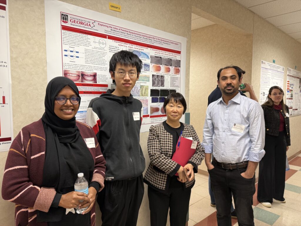 Dr. Liu with lab members in RBC symposium 2025