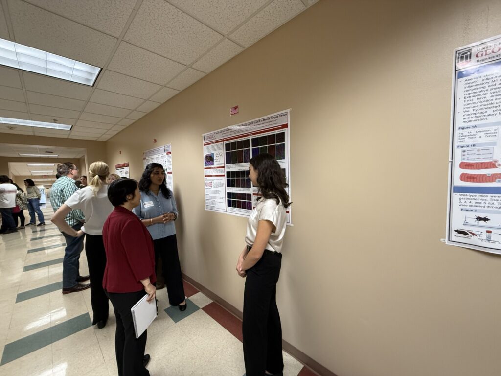 Diya and Mckenna presenting their project to Dr. Liu.