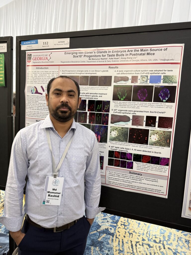 Man standing in front of poster presentation