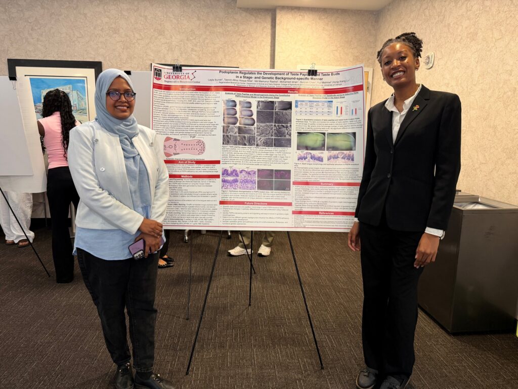 Layla with grad student Tasnim from Liu lab while presenting